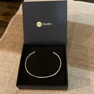MUCER BANGLE BRACELET.